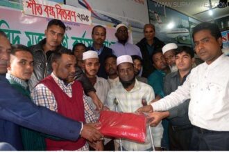 দারিদ্র মুক্তকরণ কর্মসূচী বাংলাদেশ’র দরিদ্রদের মধ্যে শীত বস্ত্র বিতরণ - Surma Times Archive